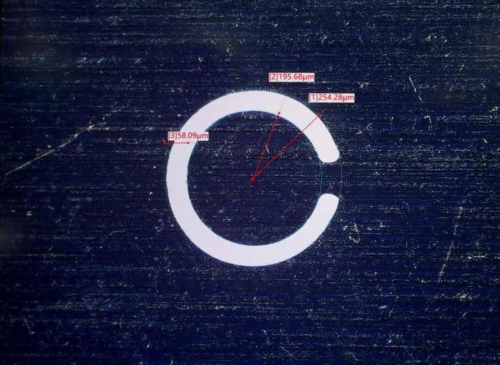 Case and application of femtosecond laser processing of shaped through holes