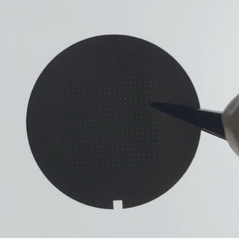 Femtosecond laser processing of microvia arrays on stainless steel sheets